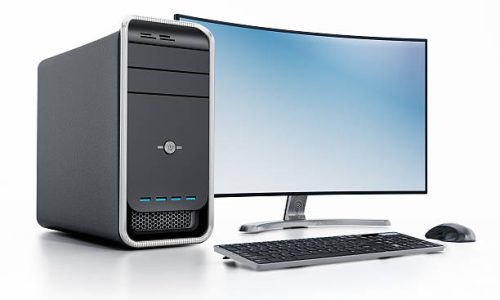 Modern desktop PC (personal computer) with curved ultra HD LED screen isolated on white. Clipping path is included in the highest file resolution.